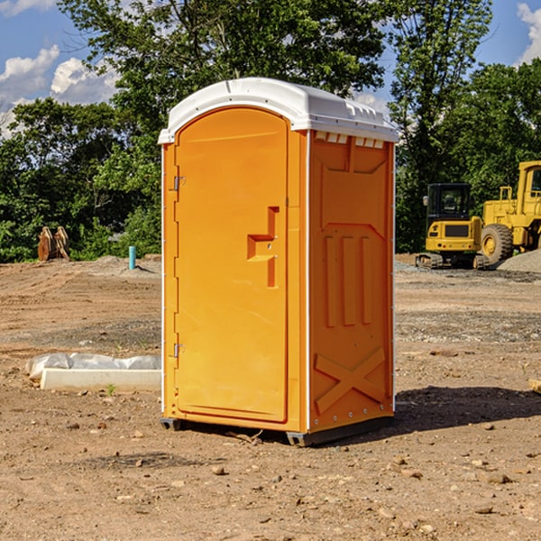 what is the cost difference between standard and deluxe portable toilet rentals in Hager City